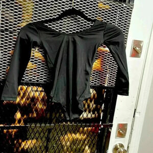 Girls dance/gymnastics top. Black . New with tags. By Mdnmd.